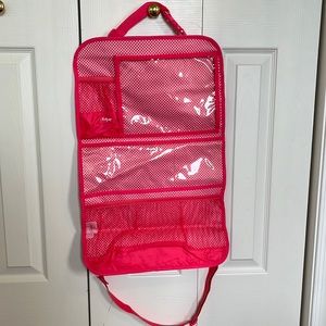 Thirty One travel makeup/jewelry fold up bag.